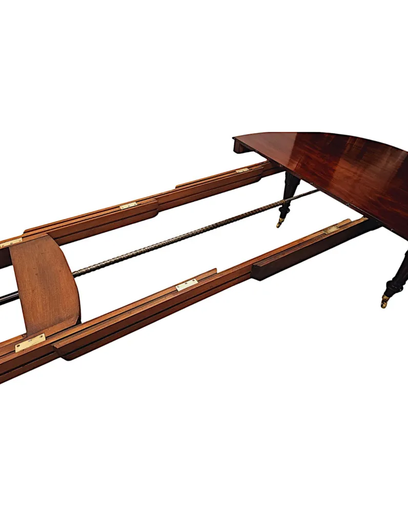 A Very Rare and Fine Irish 19th Century Four Leaf Extending Dining Table in the Manner of Strahan of Dublin