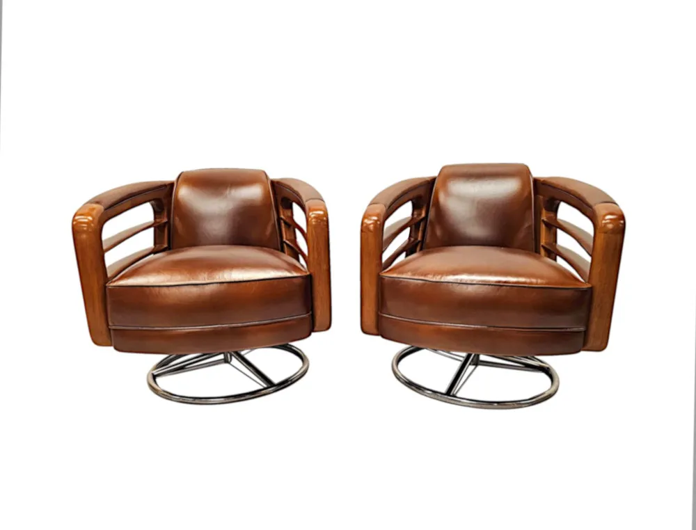 A Fabulous Hand Made Leather and Chrome Revolving Club Chair