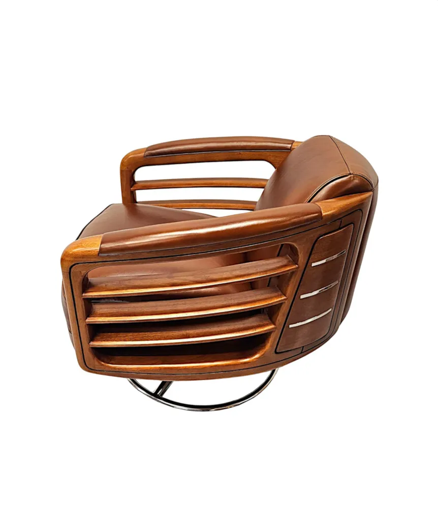 A Fabulous Hand Made Leather and Chrome Revolving Club Chair