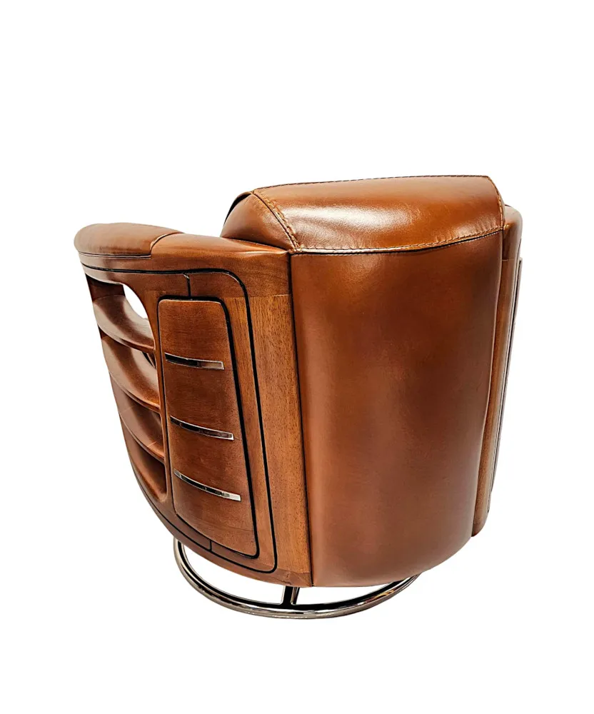A Fabulous Hand Made Leather and Chrome Revolving Club Chair