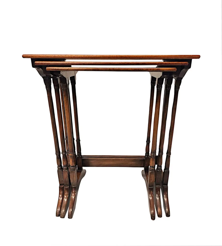  A Fabulous Early 20th Century Burr Elm Nest of Three Tables