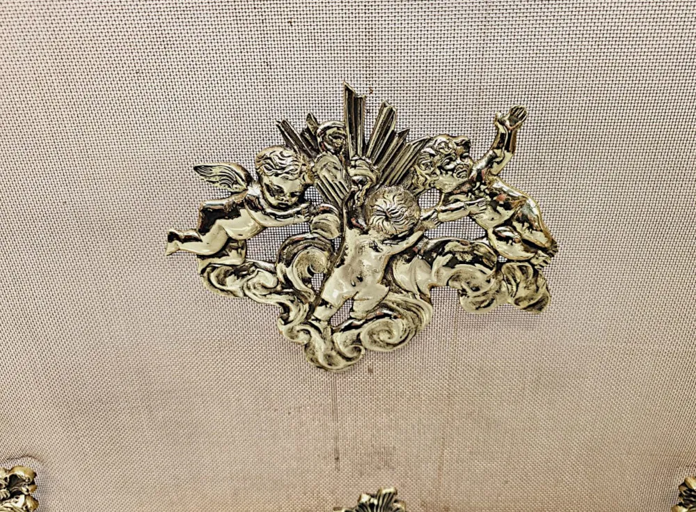 A Gorgeous 19th Century Polished  Brass Fire Screen in the Rococco Design with Cherub Detail