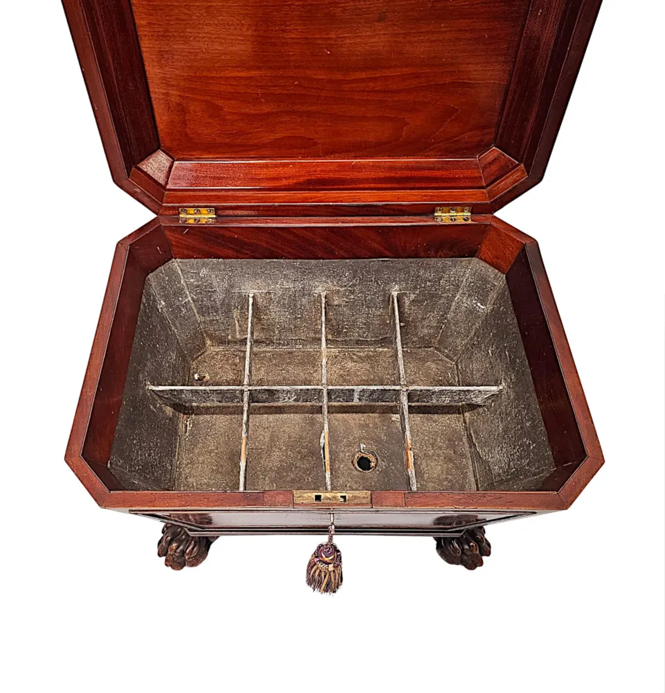 A Very Fine Early 19th Century Irish Sarcophagus Shaped Cellarette or Wine Cooler on Paw Foot