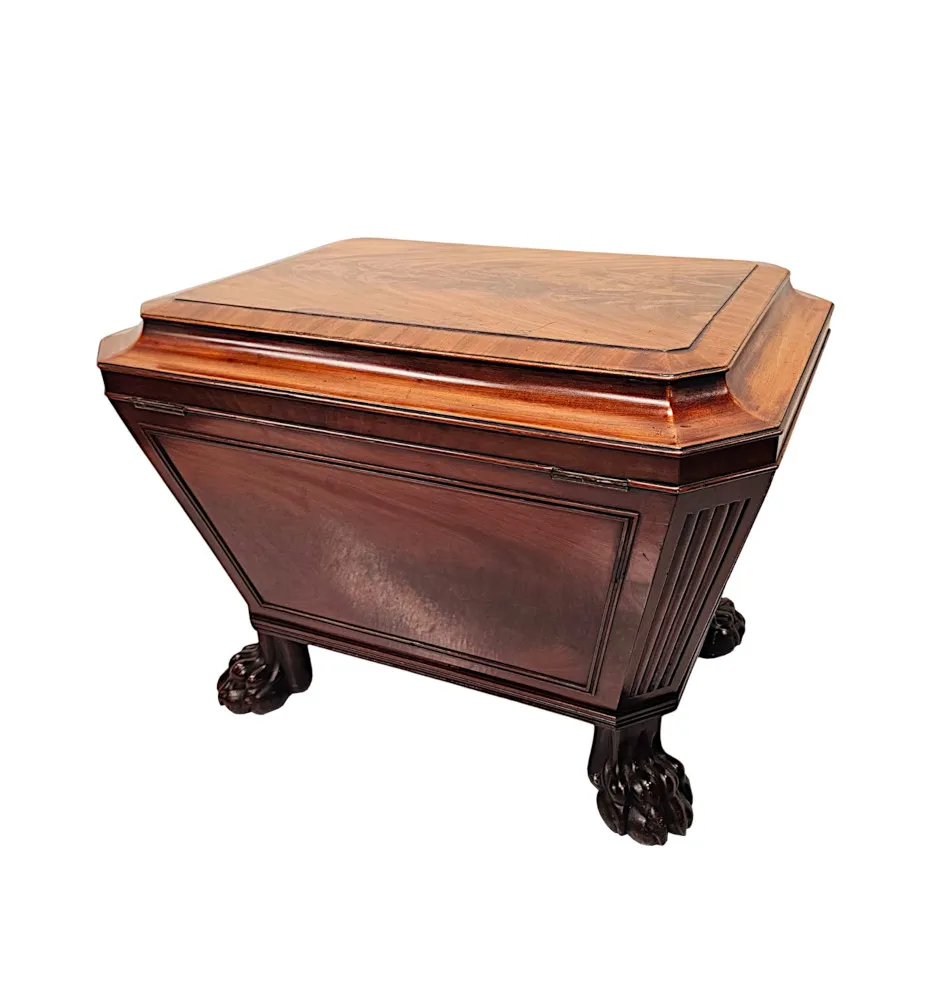 A Very Fine Early 19th Century Irish Sarcophagus Shaped Cellarette or Wine Cooler on Paw Foot