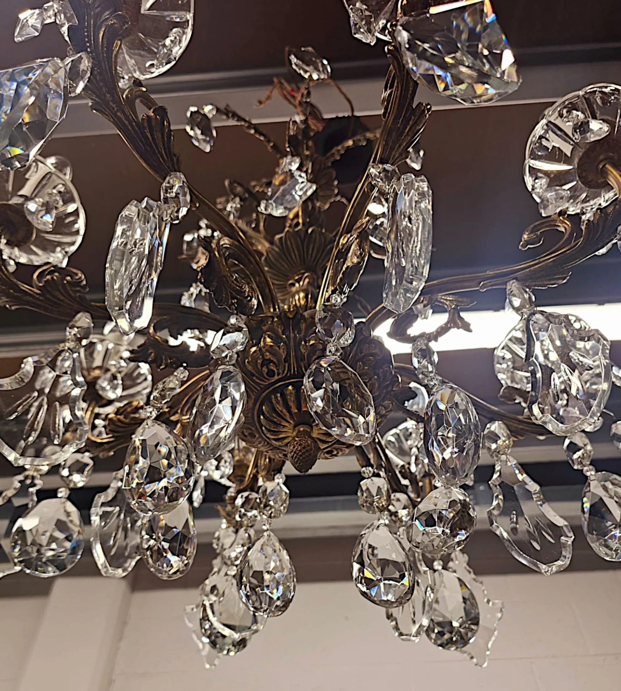 A Stunning Early 20th Century Italian Gilt Bronze and Crystal Eight Branch Rewired Chandelier