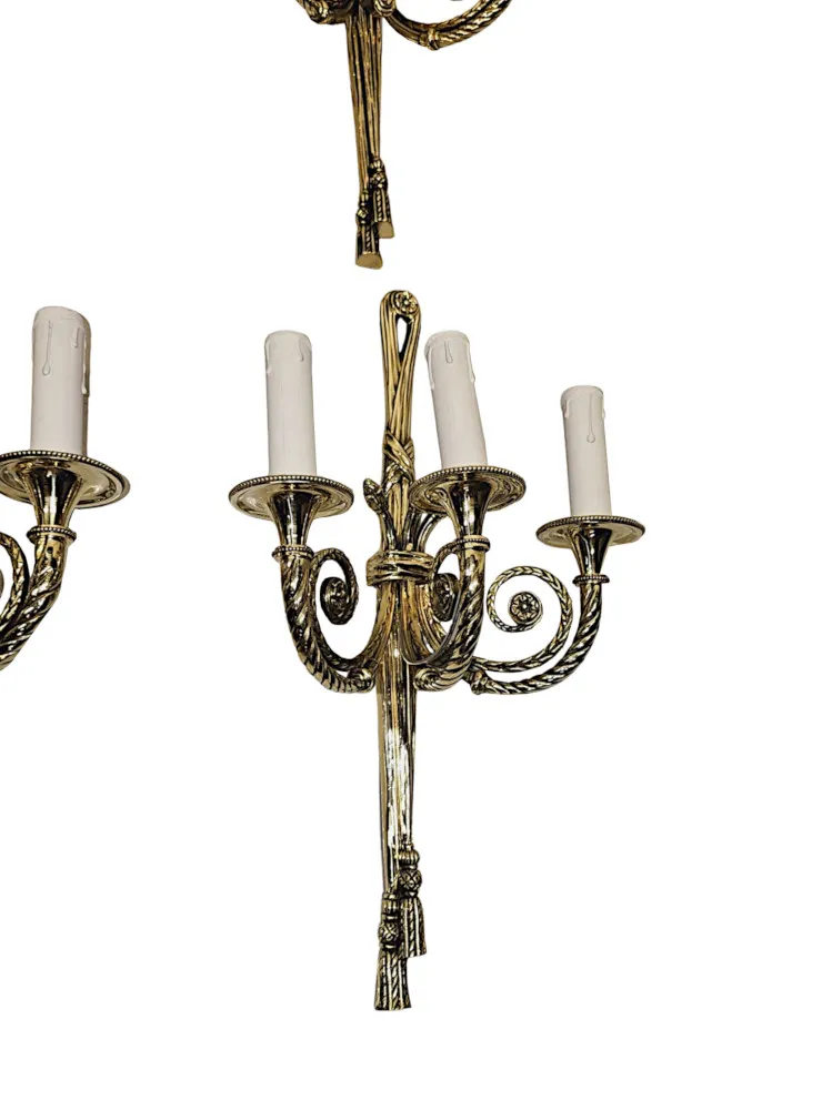 A Fabulous Set of Four Early 20th Century Three Branch Brass Wall Lights