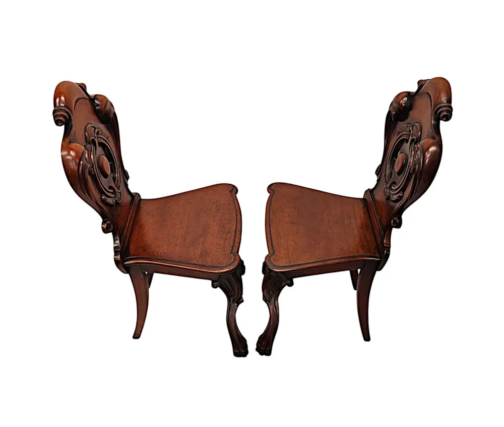 A Very Fine Pair of 19th Century Hall Chairs With Paw Foot 