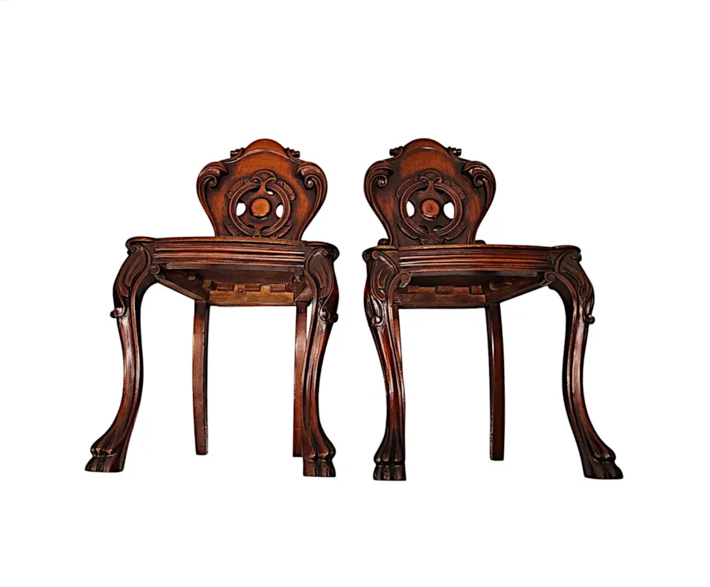 A Very Fine Pair of 19th Century Hall Chairs With Paw Foot 