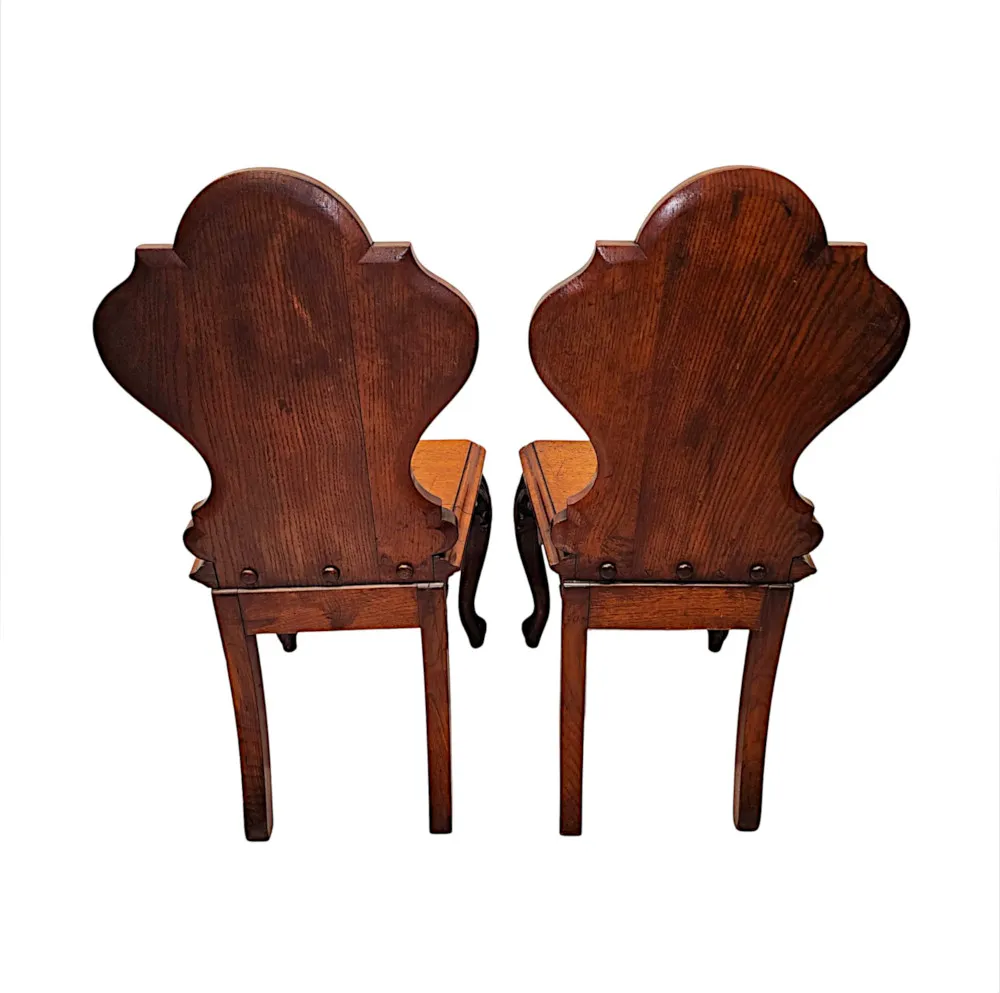 A Very Rare Pair of 19th Century Heavy Carved Oak English Country House Hall Chairs