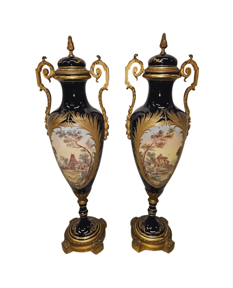 A Very Rare Pair of 19th Century French Hand Painted Sevres Style Urns with Ormolu Mounts