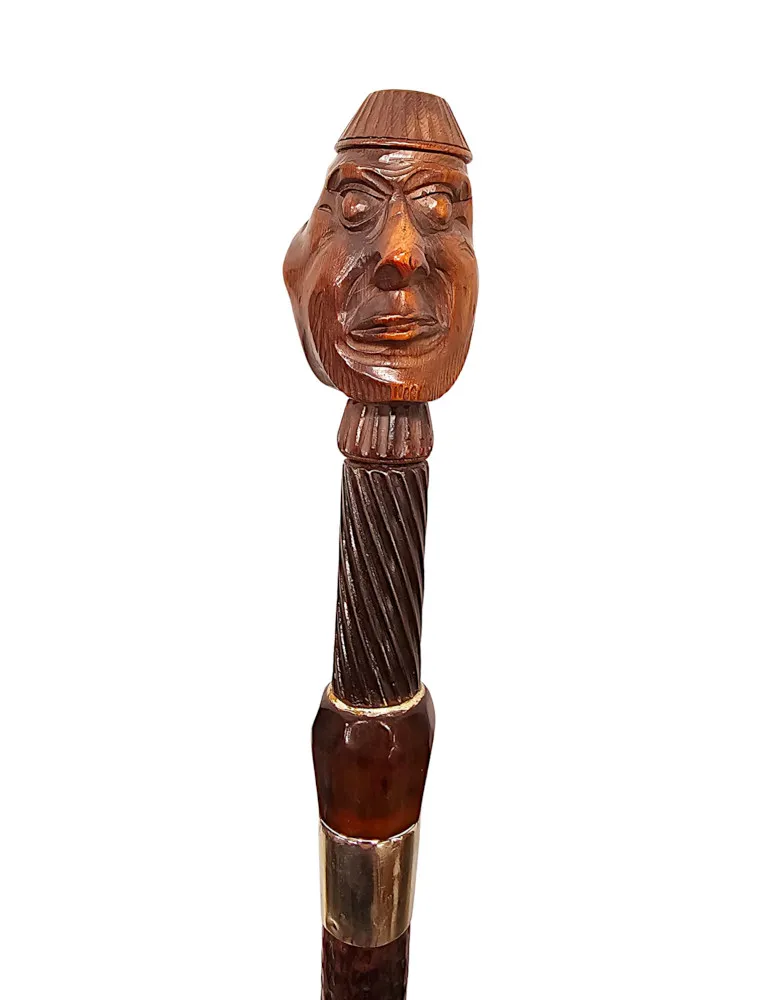 A Very Rare 19th Century Gadget Nut Cracker Walking Cane with a Pair of Carved Heads