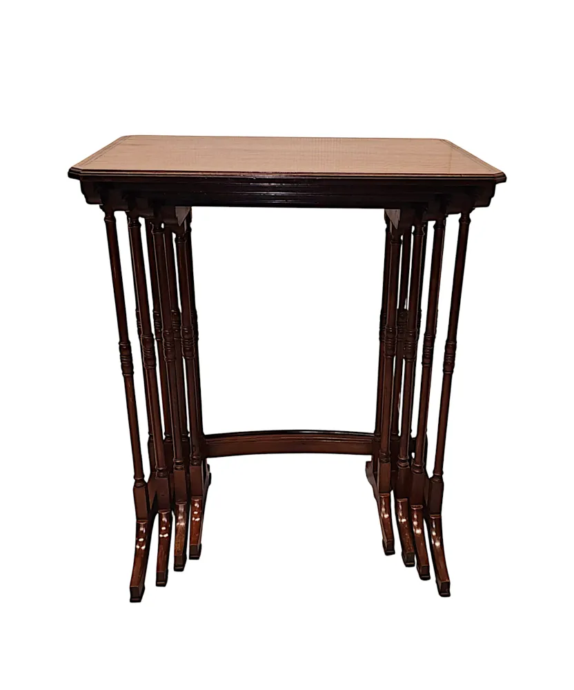 A Very Rare Edwardian Inlaid Satinwood and Mahogany Nest of Four Tables 