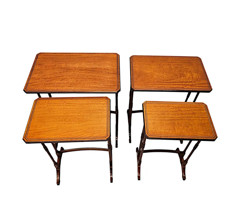 A Very Rare Edwardian Inlaid Satinwood and Mahogany Nest of Four Tables 