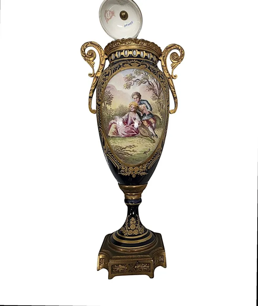  A Very Fine Pair of 19th Century Hand Painted Sevres Style Lidded Urns