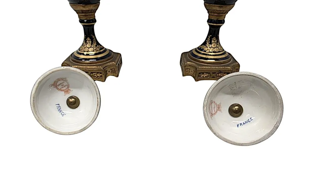  A Very Fine Pair of 19th Century Hand Painted Sevres Style Lidded Urns