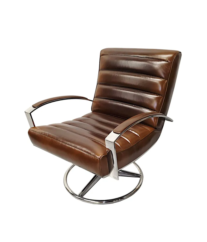  A Stunning Mid Century Style Leather and Chrome Revolving Armchair