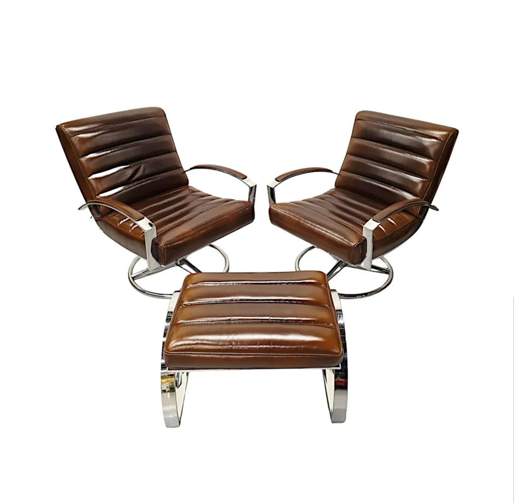  A Stunning Mid Century Style Leather and Chrome Revolving Armchair