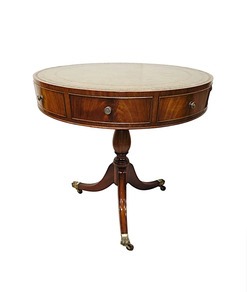 A Stunning Early 20th Century Leather Top Revolving Drum Table