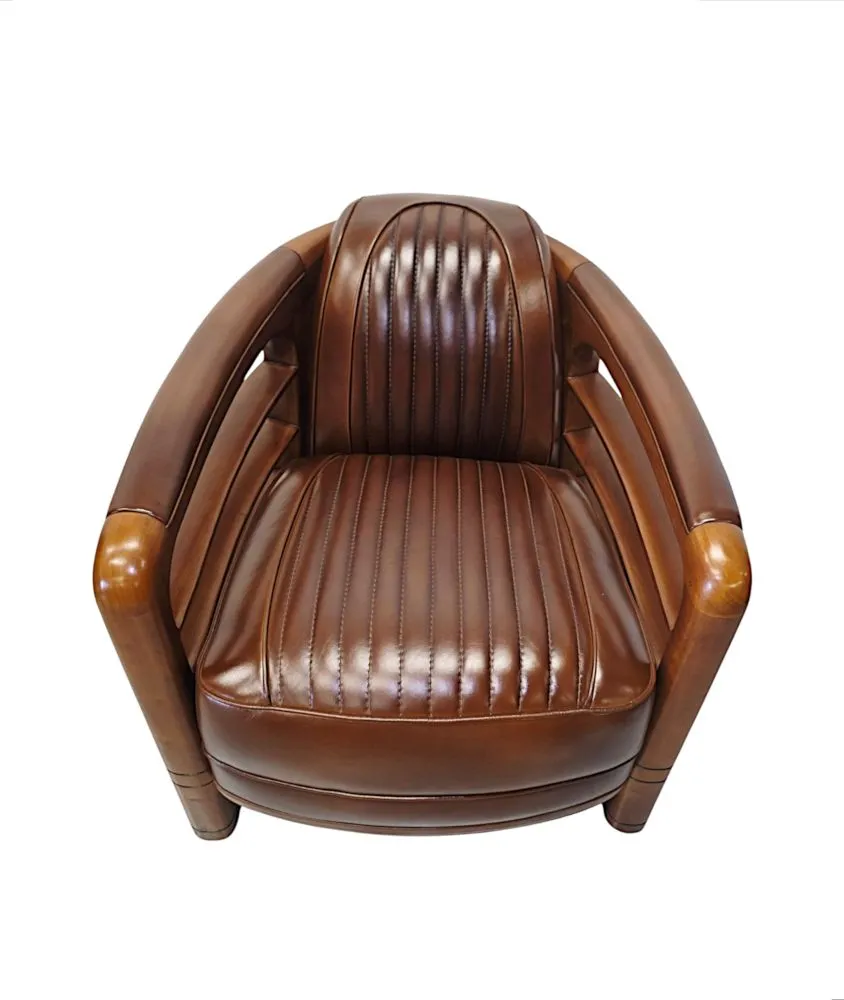 A Very Fine Art Deco Design Walnut and Leather Club Armchair