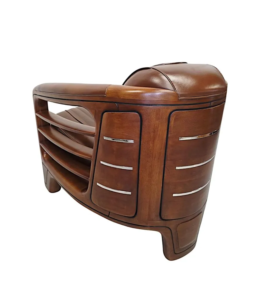 A Very Fine Art Deco Design Walnut and Leather Club Armchair