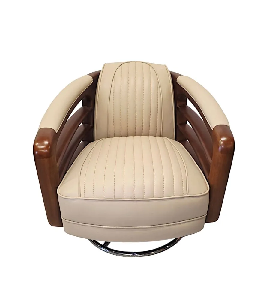  A Stunning Handmade Leather Walnut and Chrome Revolving Armchair