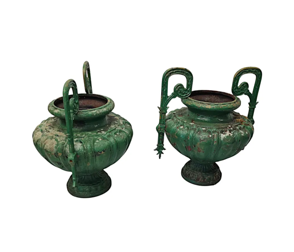 A Very Rare Pair of 19th Century Heavy Cast Iron Garden Urns