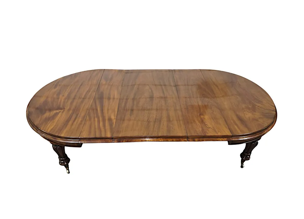 A Fabulous 19th Century Dining Table with Three Extra Leaves 