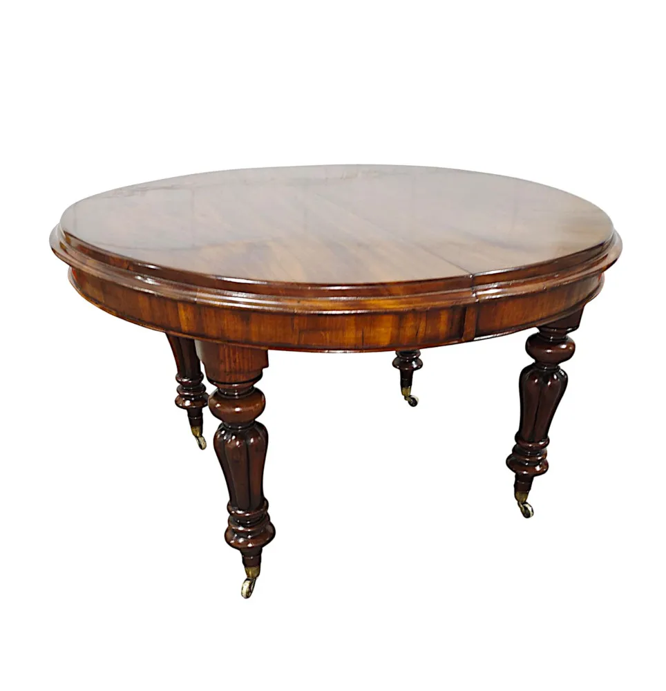A Fabulous 19th Century Dining Table with Three Extra Leaves 