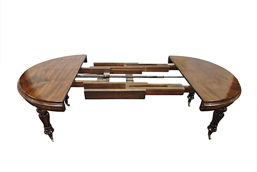 A Fabulous 19th Century Dining Table with Three Extra Leaves 
