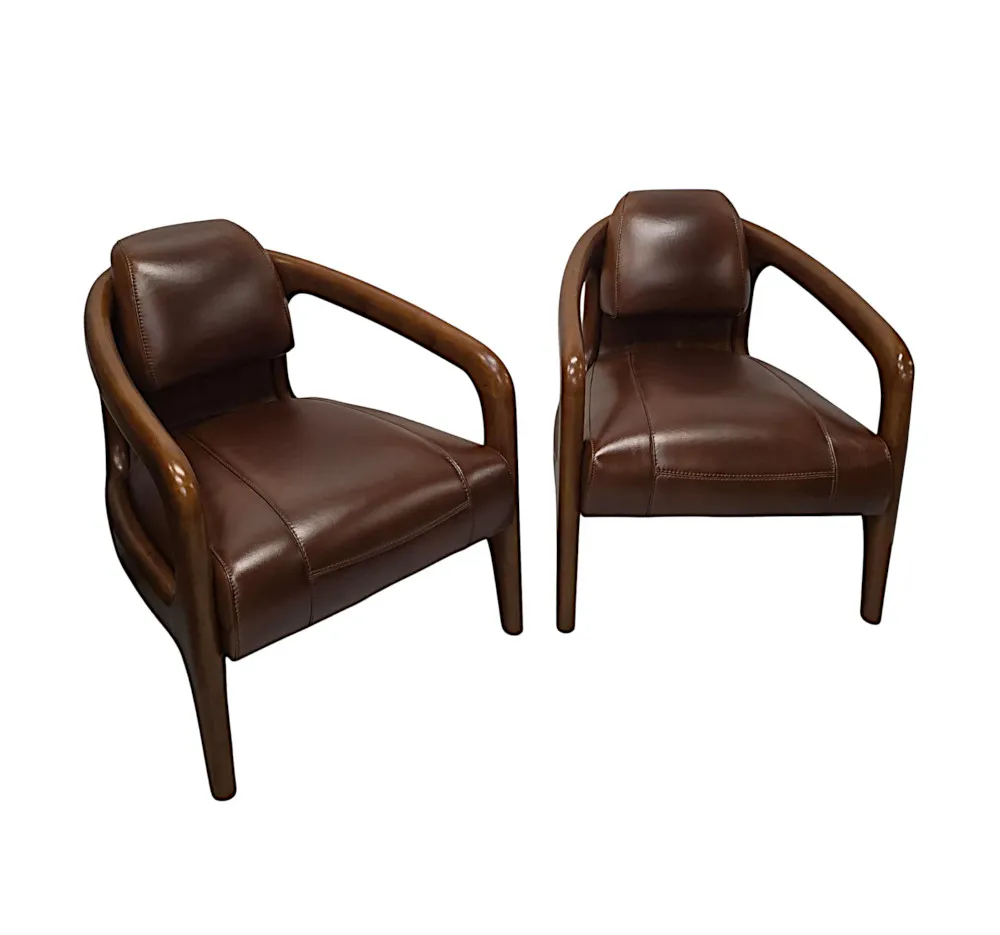 A Fabulous Mid Century Design Walnut and Leather Armchair