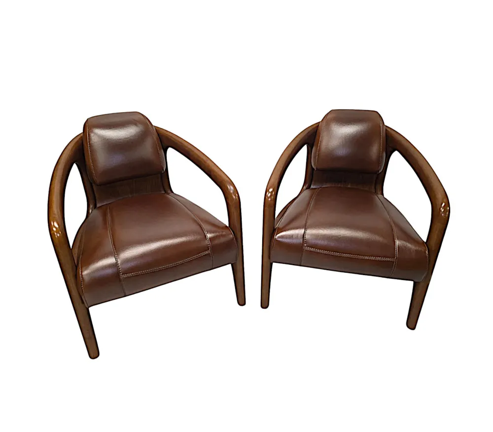 A Fabulous Mid Century Design Walnut and Leather Armchair