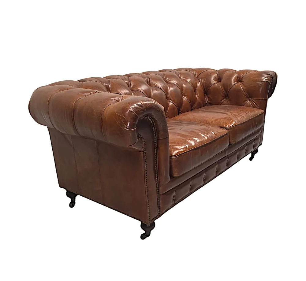 A Fabulous Leather Chesterfield Two Seater Couch in the Victorian Manner