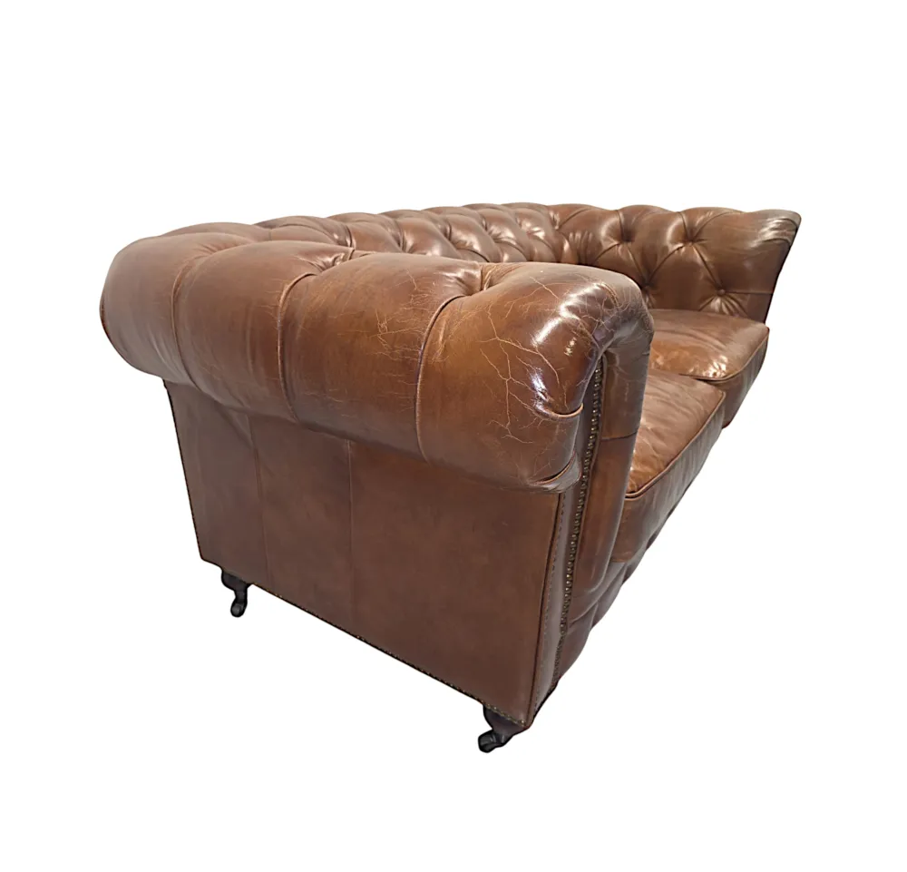 A Fabulous Leather Chesterfield Two Seater Couch in the Victorian Manner