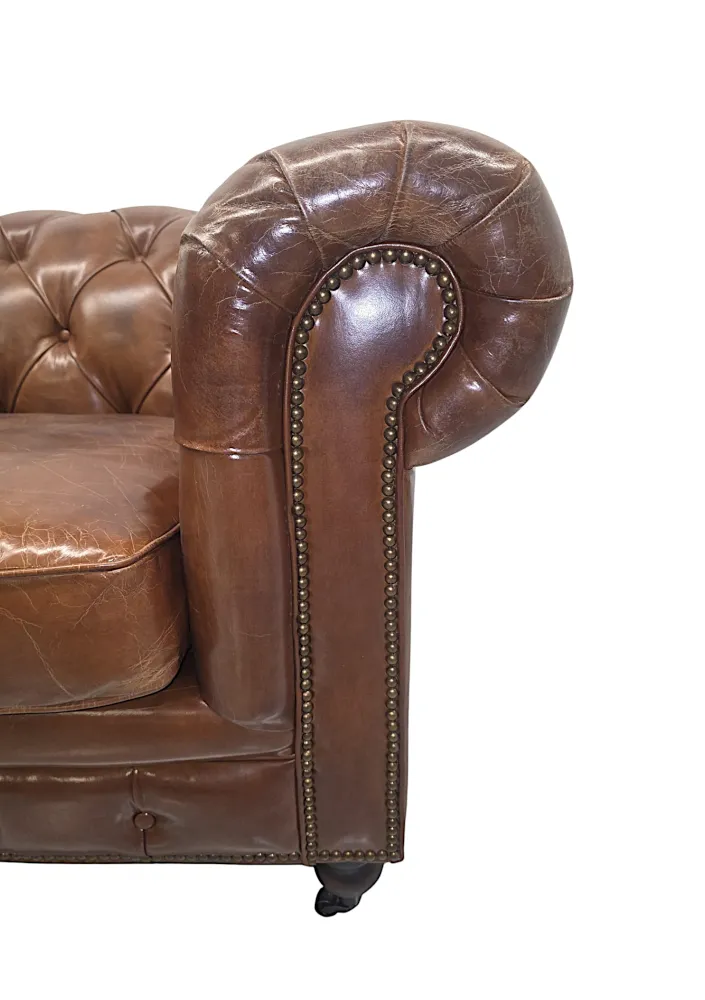 A Fabulous Leather Chesterfield Two Seater Couch in the Victorian Manner