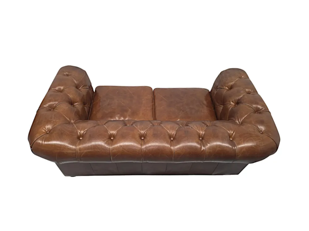 A Fabulous Leather Chesterfield Two Seater Couch in the Victorian Manner